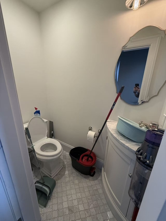 15 Cedar Road Brookline, MA 02467 - Photo 10 of 26 a bathroom with a toilet and a sink