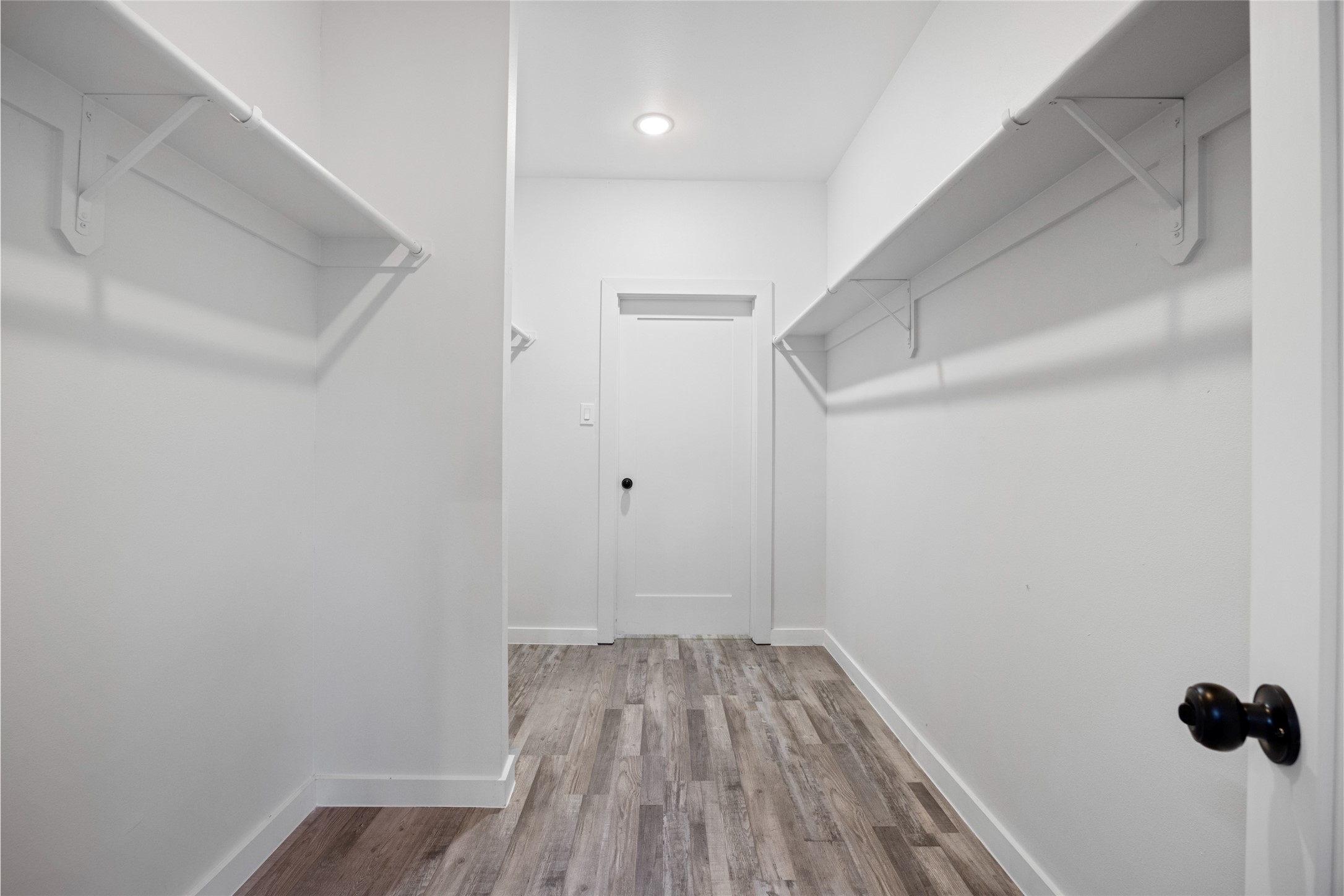 13107 Beauty Berry Ridge Lane Cypress, TX 77429 - Photo 21 of 33 a view of a room with wooden floor