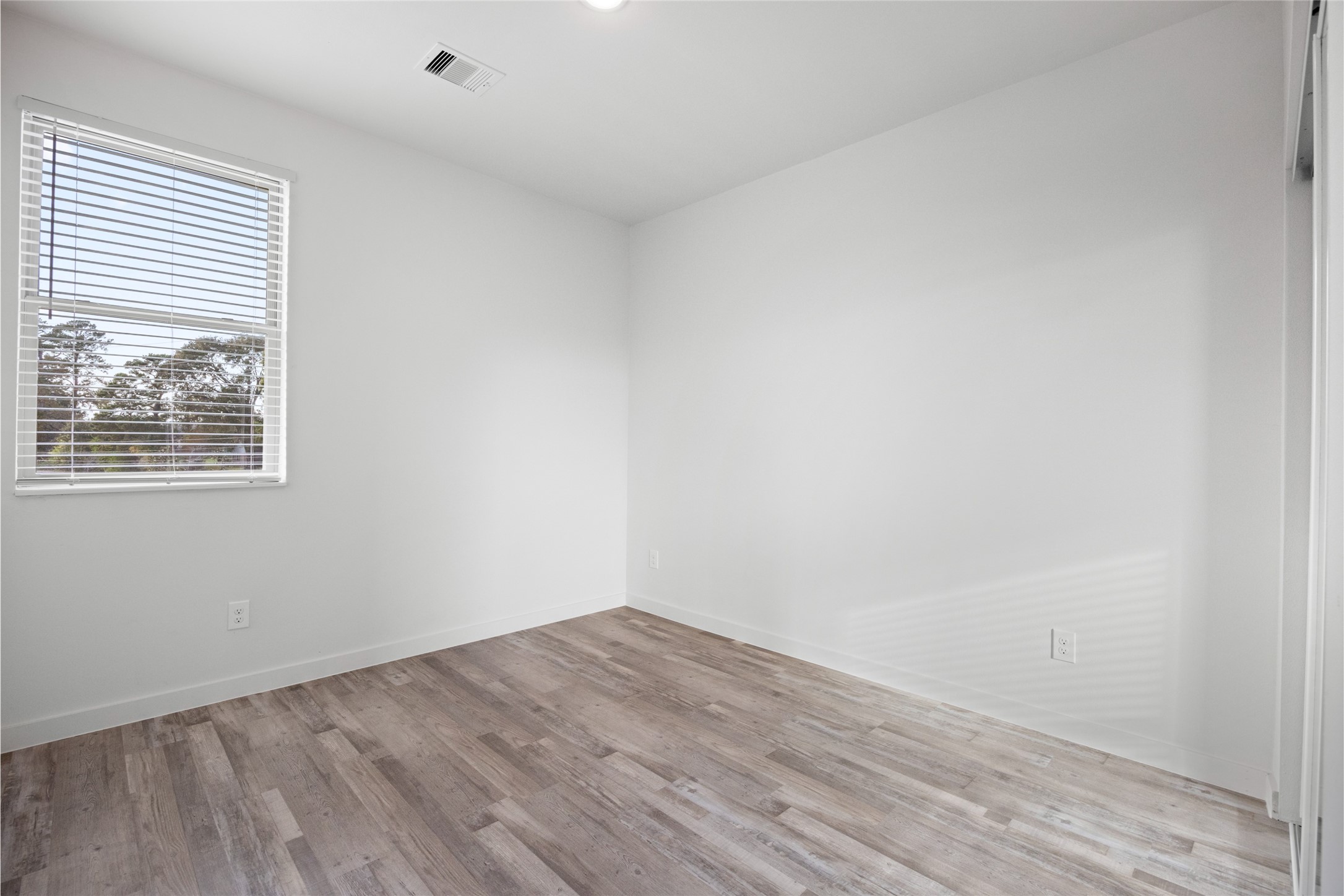 13107 Beauty Berry Ridge Lane Cypress, TX 77429 - Photo 25 of 33 an empty room with a window