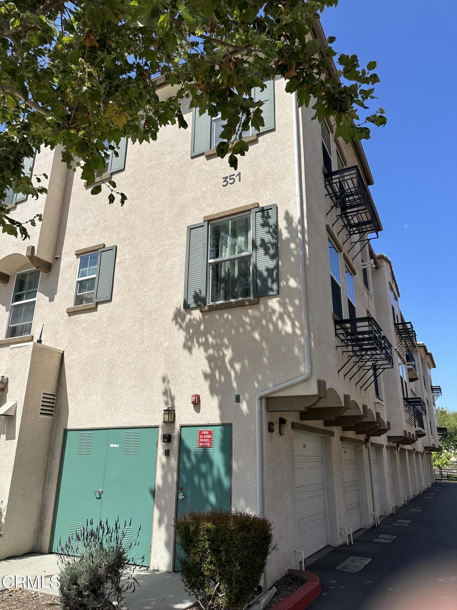 351 Riverpark Boulevard, Unit 203 Oxnard, CA 93036 - Photo 2 of 2 a view of a house with a windows