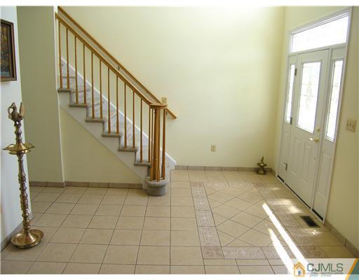 46 Lexington Road Monmouth Junction, NJ 08852 - Photo 2 of 10 a view of an entryway with staircase