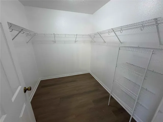 a view of a room with racks on the wall