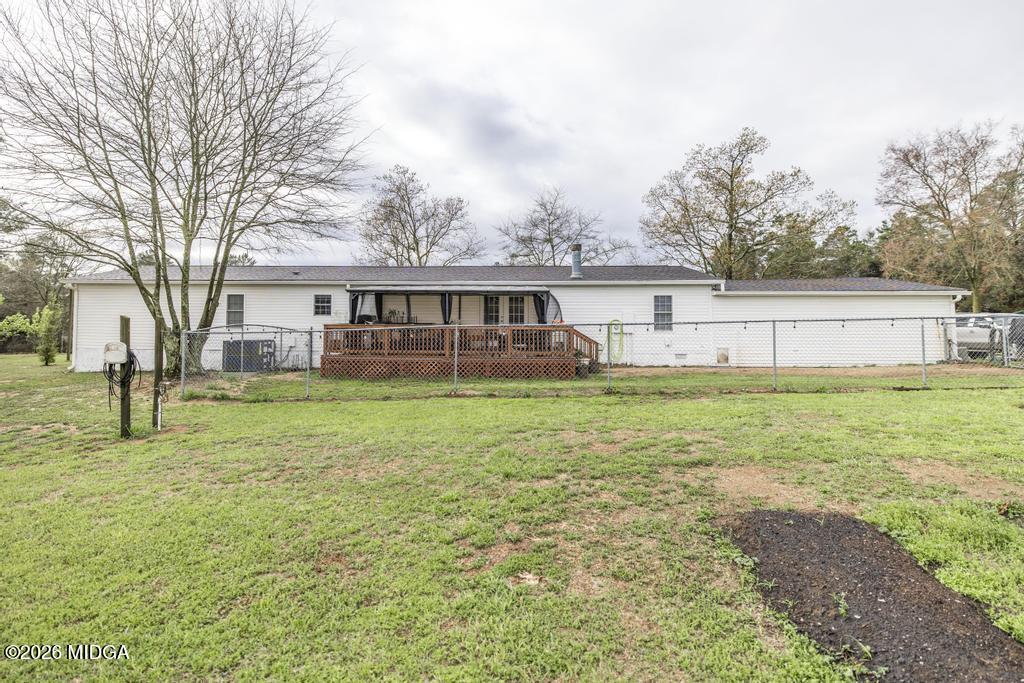 319 Pope Road Roberta, GA 31078 - Photo 31 of 42 a view of a house with backyard and trees