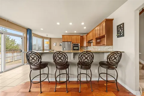 a view of a chairs and table in a room