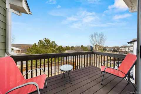 a view of a chair in wooden deck