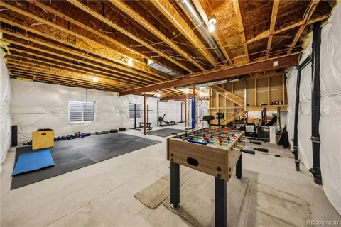 a view of a backyard with swimming pool