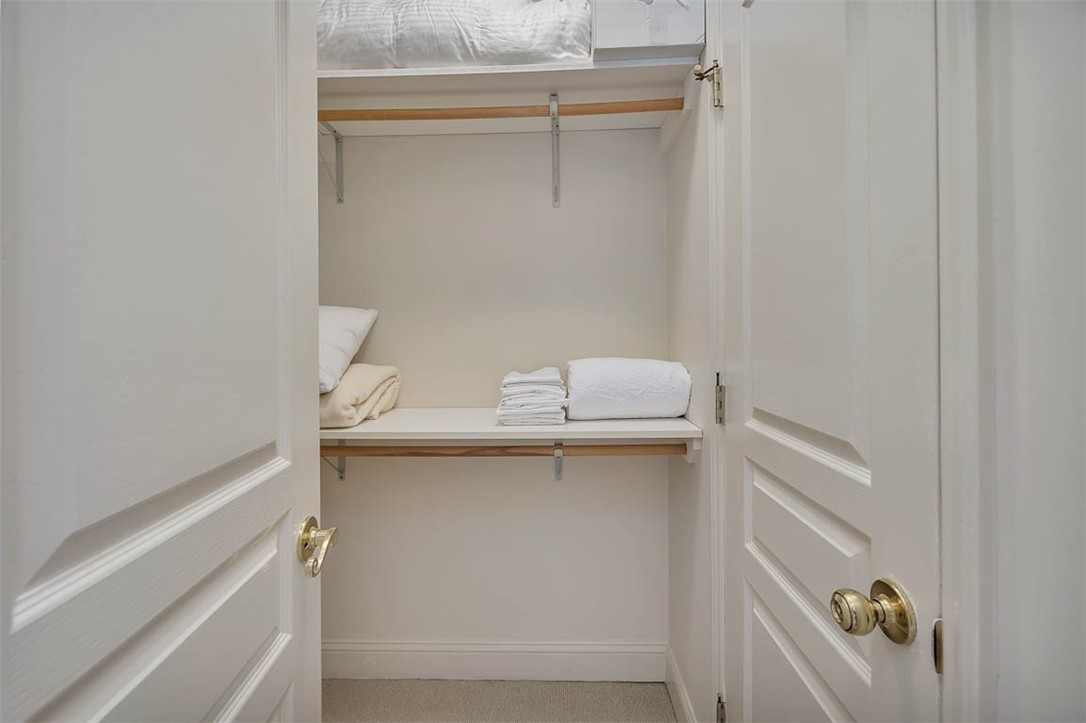 1400 Ocean Boulevard, Unit 219 St. Simons Island, GA 31522 - Photo 33 of 34 Linen Closet