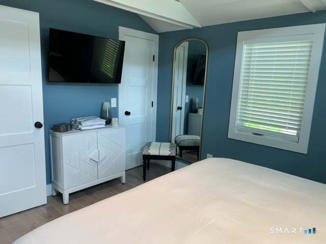7 Old Turnpike Road South North Canaan, CT 06024 - Photo 13 of 20 a bedroom with a bed and a flat tv screen on dresser