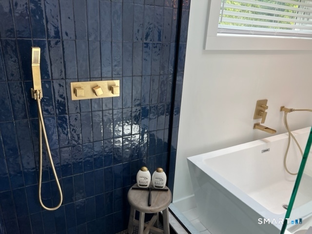 7 Old Turnpike Road South North Canaan, CT 06024 - Photo 17 of 20 a bathroom with a sink and a shower