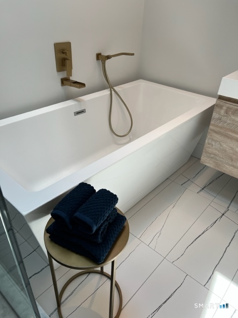 7 Old Turnpike Road South North Canaan, CT 06024 - Photo 18 of 20 a bathroom with a bathtub and shower