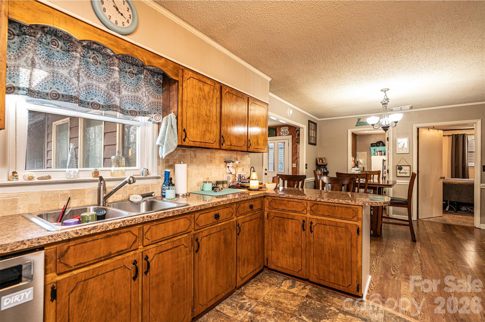 1689 Rock Road Rutherfordton, NC 28139 - Photo 39 of 47 a kitchen with lots of counter top space and dining table