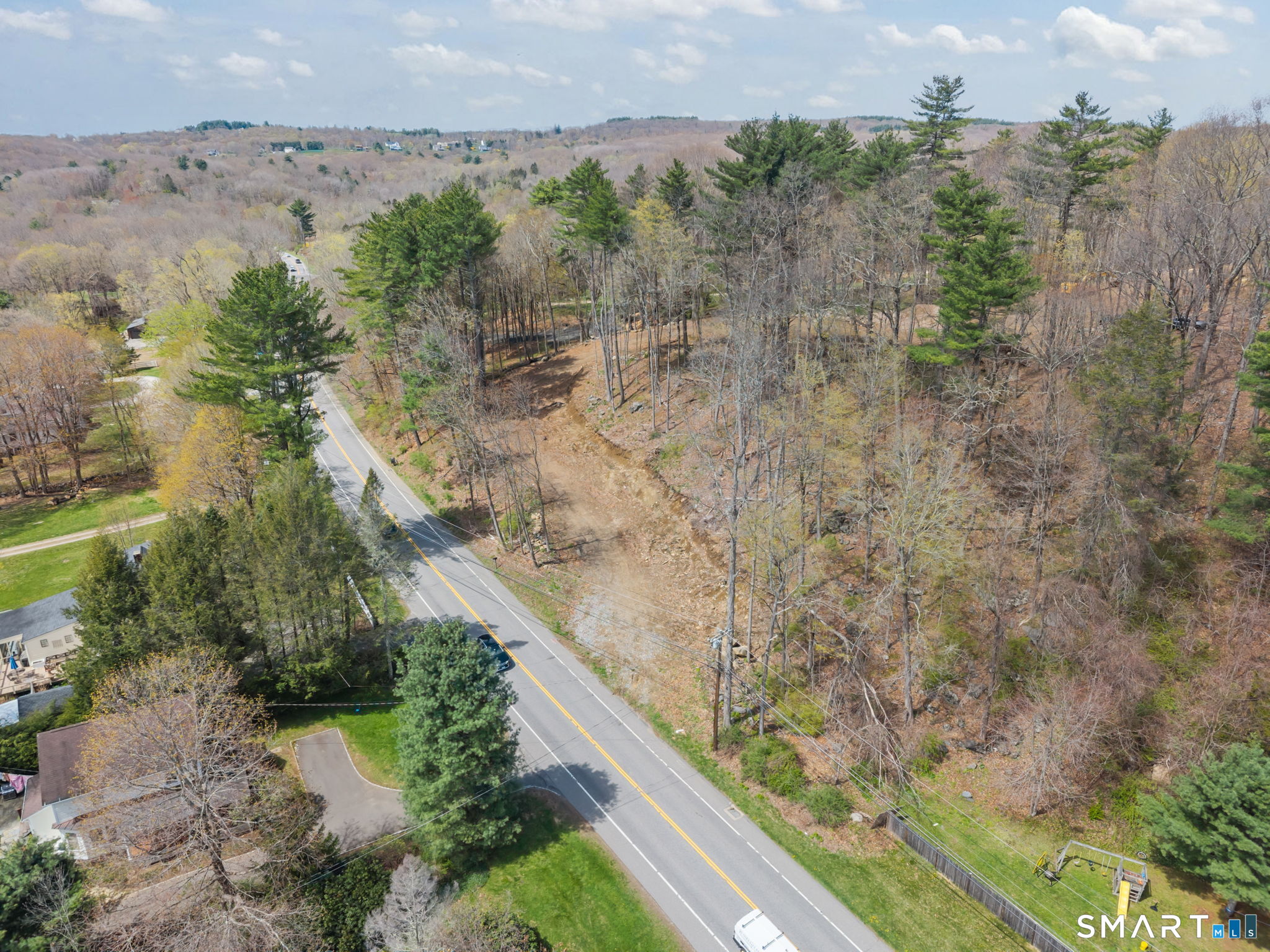 1222 Bantam Road Litchfield, CT 06750 - Photo 4 of 13 a view of a lake with a mountain in the background