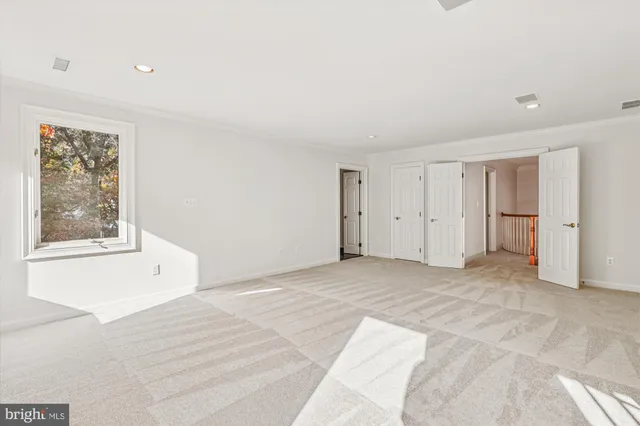 a bathroom with a shower curtain and a shower