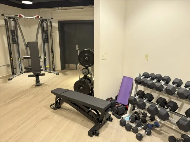 a view of a room with wooden fence