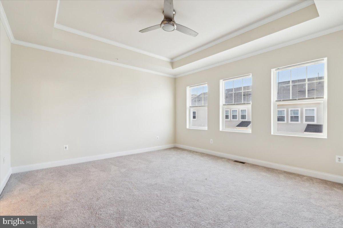 7142 Proclamation Place Frederick, MD 21703 - Photo 24 of 37 an empty room with windows