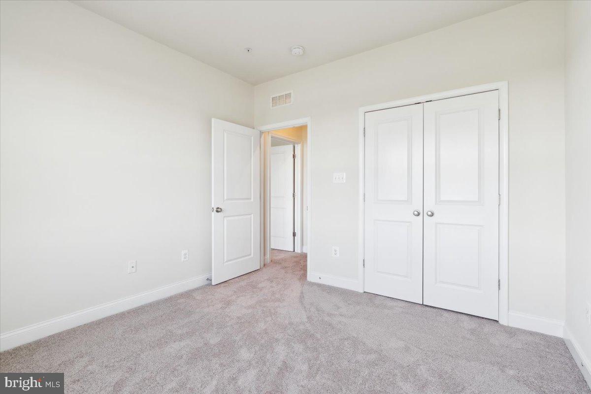7142 Proclamation Place Frederick, MD 21703 - Photo 28 of 37 a view of an empty room