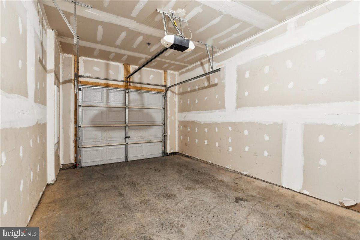 7142 Proclamation Place Frederick, MD 21703 - Photo 34 of 37 a view of a room with racks on the wall