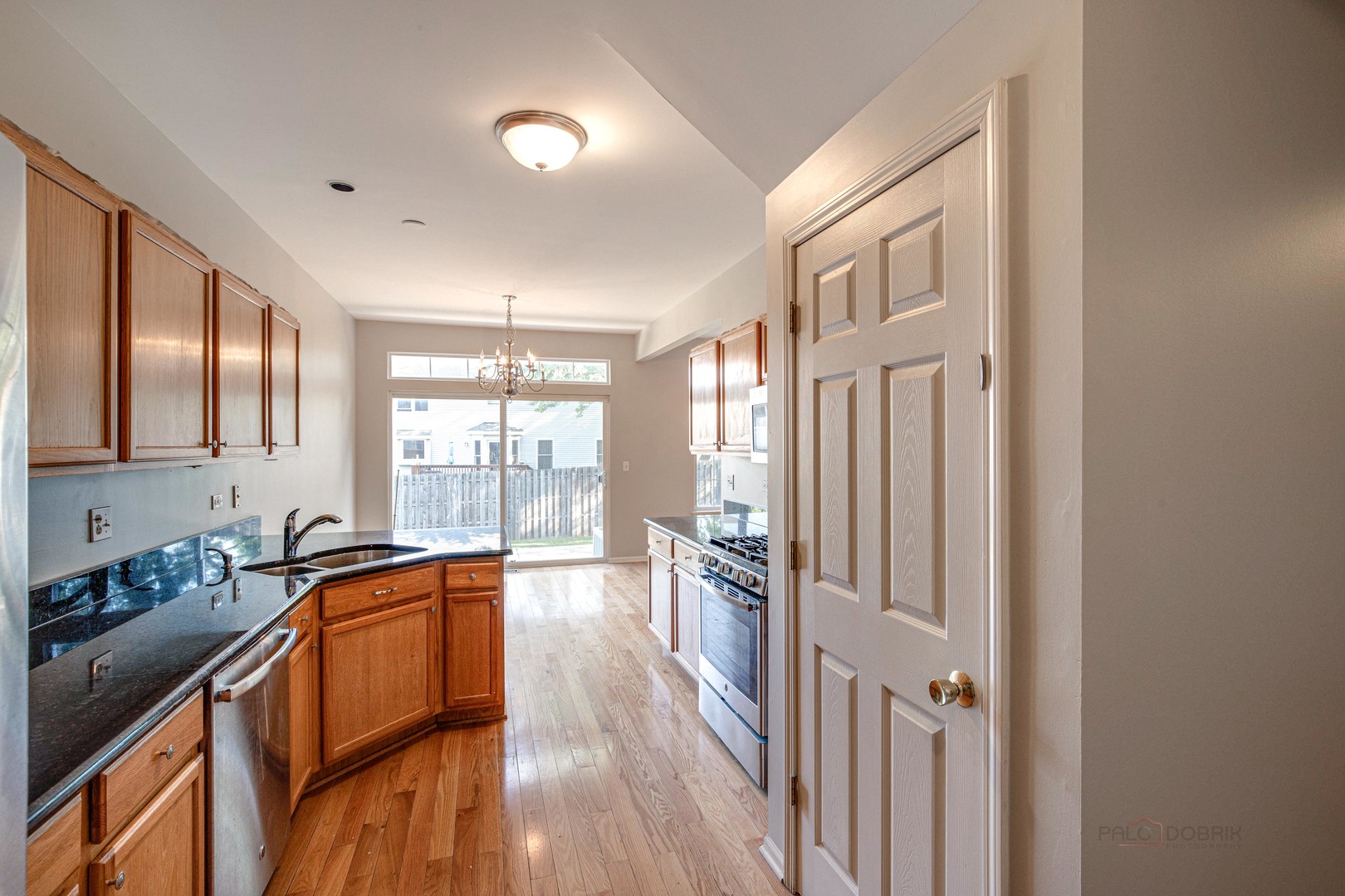 1655 Windward Court Naperville, IL 60563 - Photo 17 of 34 a view of a kitchen and a sink