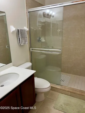 a view of a garden from a balcony