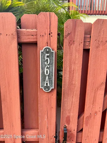 a chair and tables in the patio