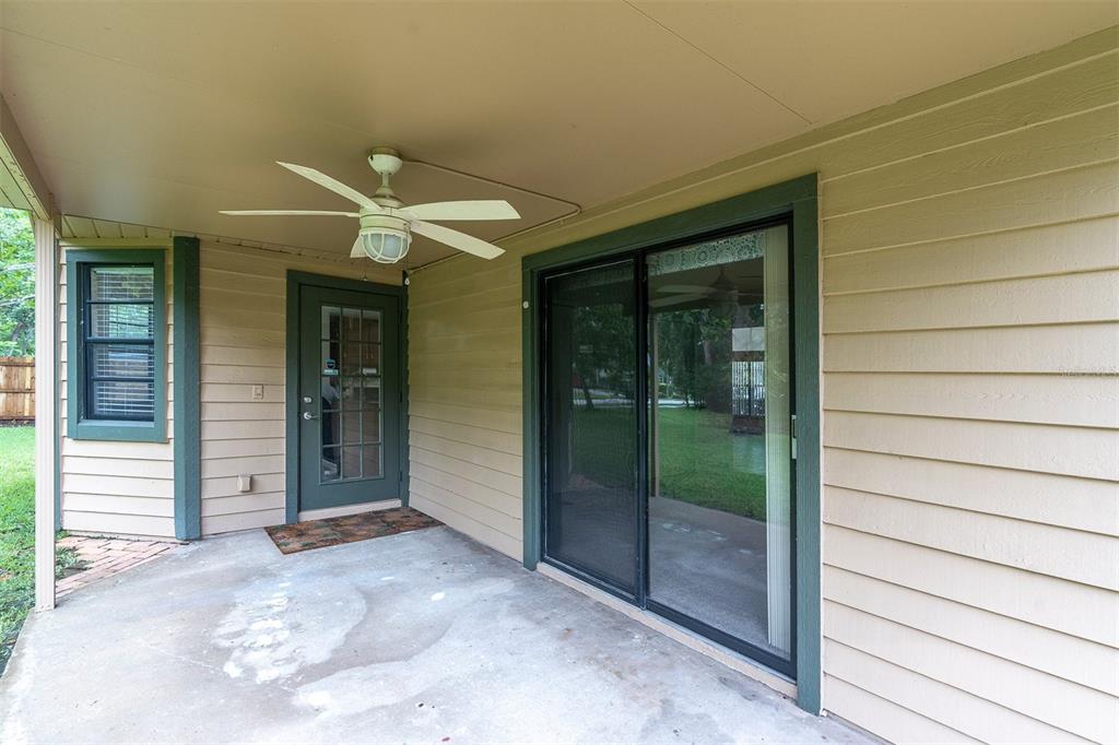 7230 Hummingbird Lane New Port Richey, FL 34655 - Photo 29 of 41 a view of a hallway with front door