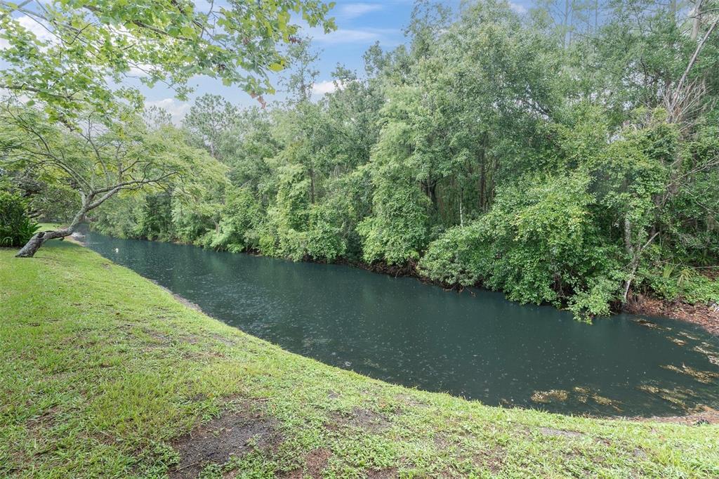 7230 Hummingbird Lane New Port Richey, FL 34655 - Photo 34 of 41 an aerial view of valley and lake