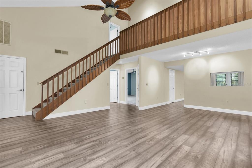 7230 Hummingbird Lane New Port Richey, FL 34655 - Photo 6 of 41 a view of an entryway with wooden floor
