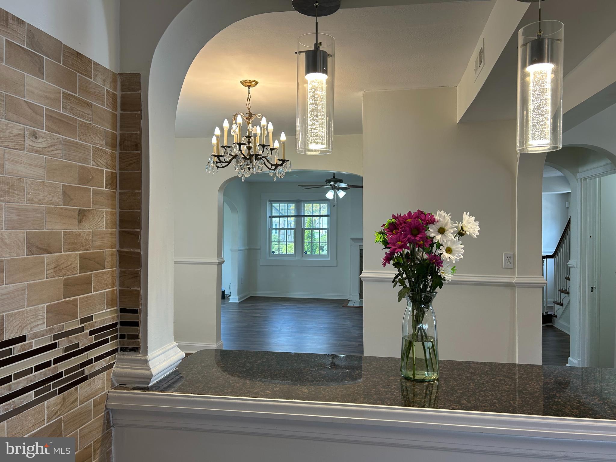 3405 Dennlyn Road Baltimore, MD 21215 - Photo 7 of 20 a vase of flowers sitting on a table