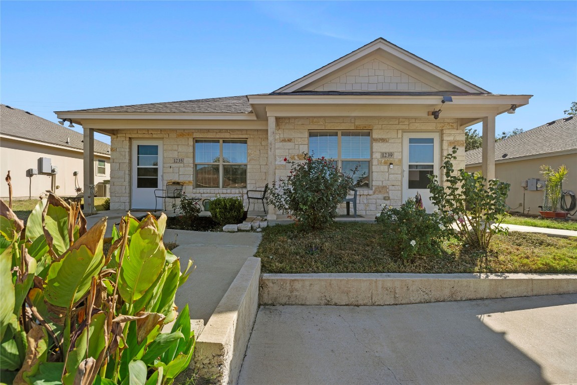 1239 Honor Lane Temple, TX 76501 - Photo 2 of 21 front view of a house with potted plants
