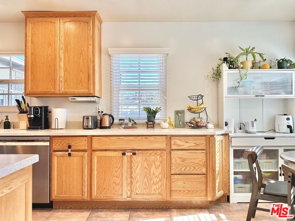 2132 Mcpherson Place Los Angeles, CA 90032 - Photo 12 of 28 a kitchen with a sink cabinets and a window