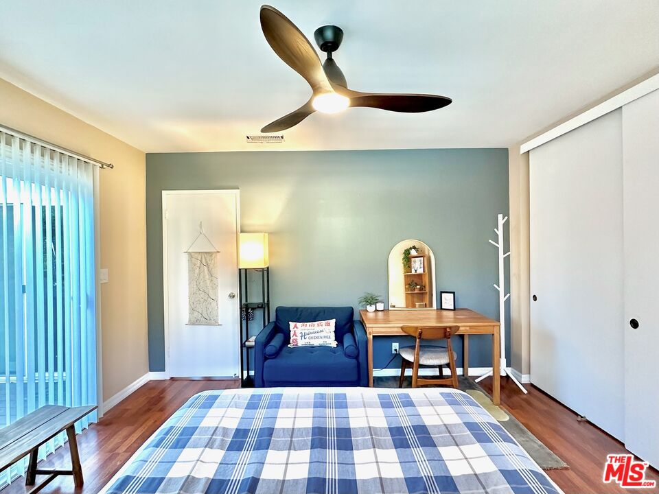 2132 Mcpherson Place Los Angeles, CA 90032 - Photo 23 of 28 a bedroom with a bed and a mirror