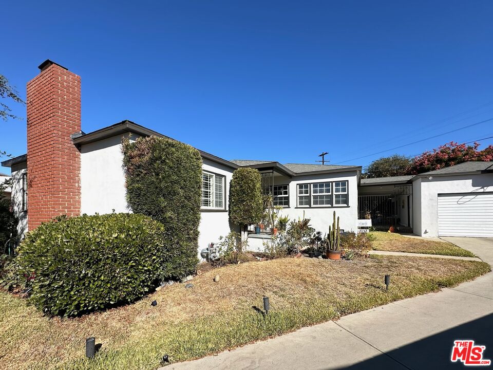 2132 Mcpherson Place Los Angeles, CA 90032 - Photo 27 of 28 a view of a house with a yard