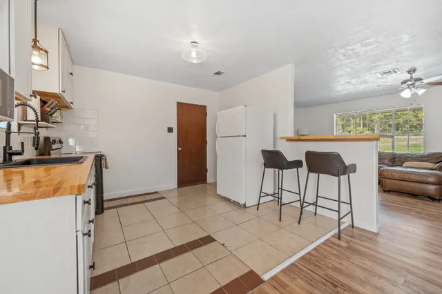 a room with furniture and a large window