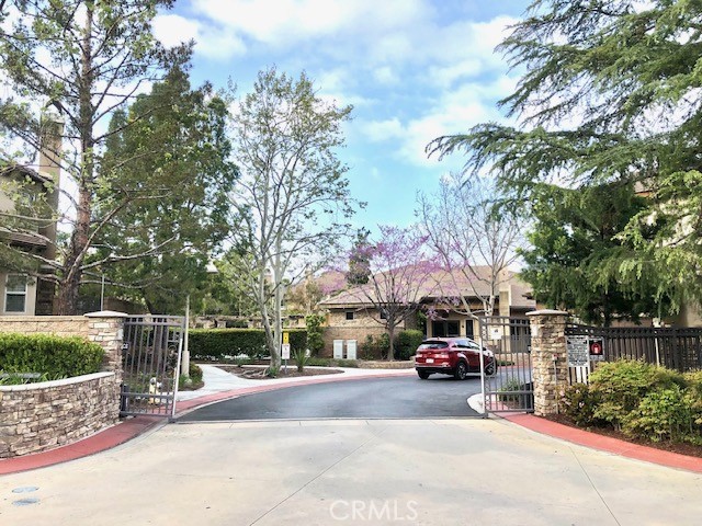 8692 East 9th Street, Unit 56 Rancho Cucamonga, CA 91730 - Photo 2 of 34 a view of street with parked cars