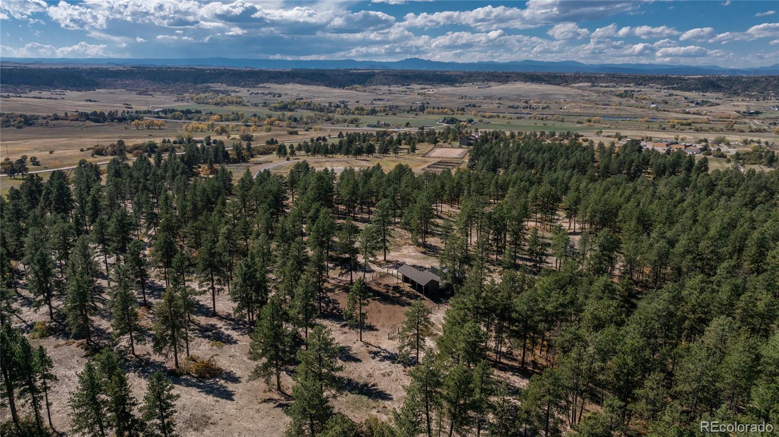 854 Russellville Road Franktown, CO 80116 - Photo 12 of 35 a view of city and mountain