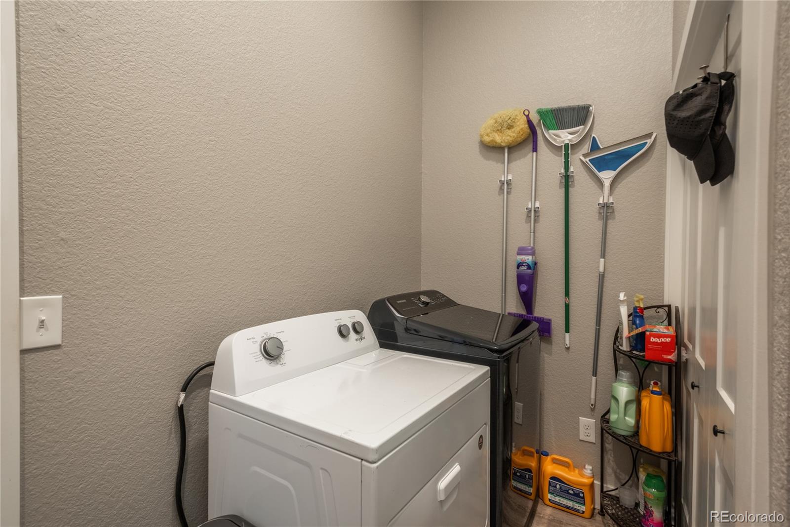 854 Russellville Road Franktown, CO 80116 - Photo 33 of 35 a utility room with dryer and washer
