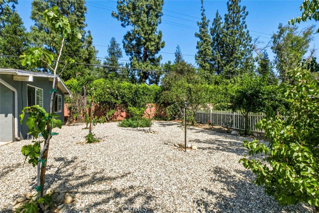 301 West Ashby Street Azusa, CA 91702 - Photo 44 of 75 a house with trees in the background
