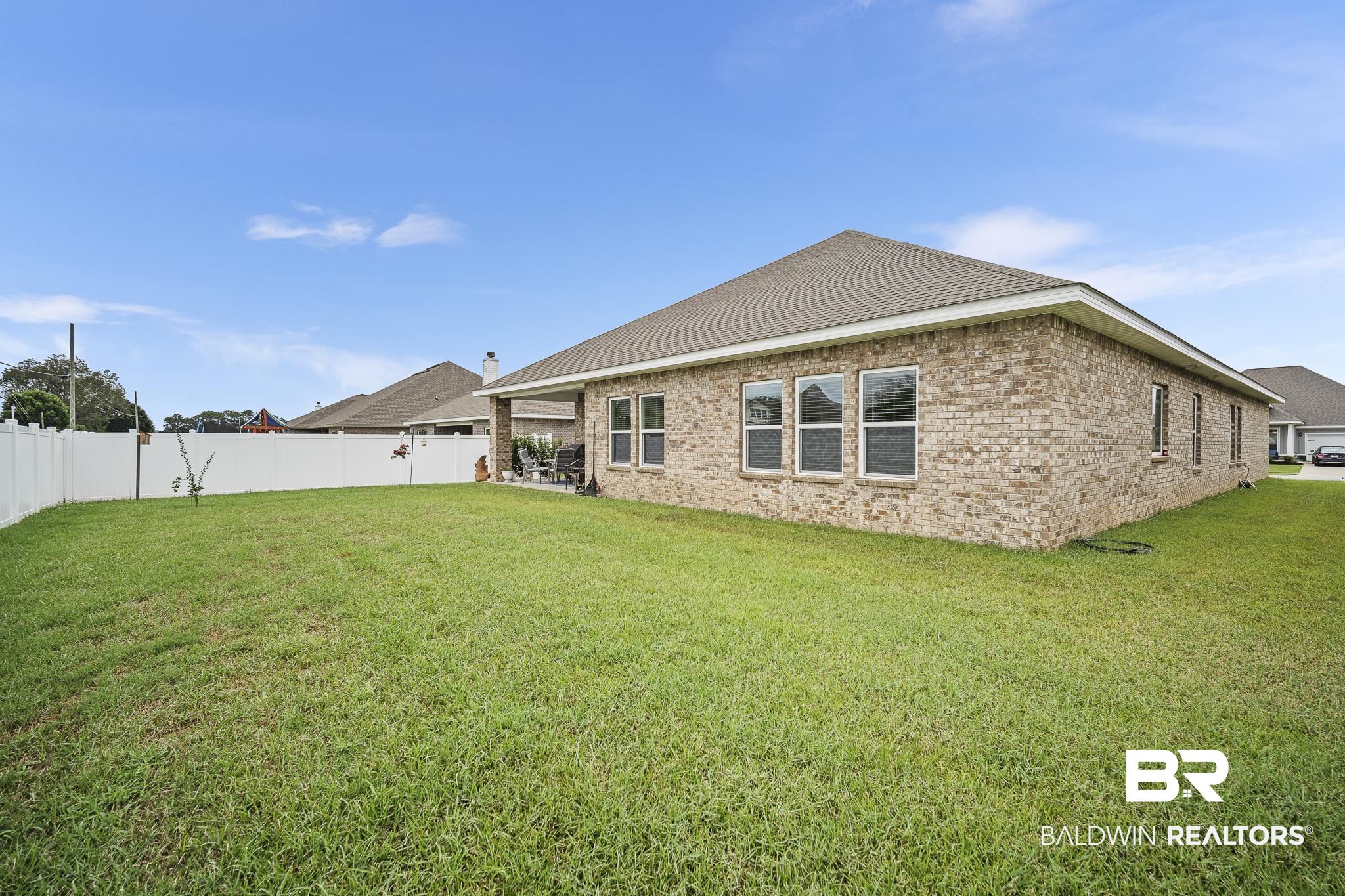 24765 Spectacular Bid Loop Daphne, AL 36526 - Photo 45 of 45 Back of house with a yard