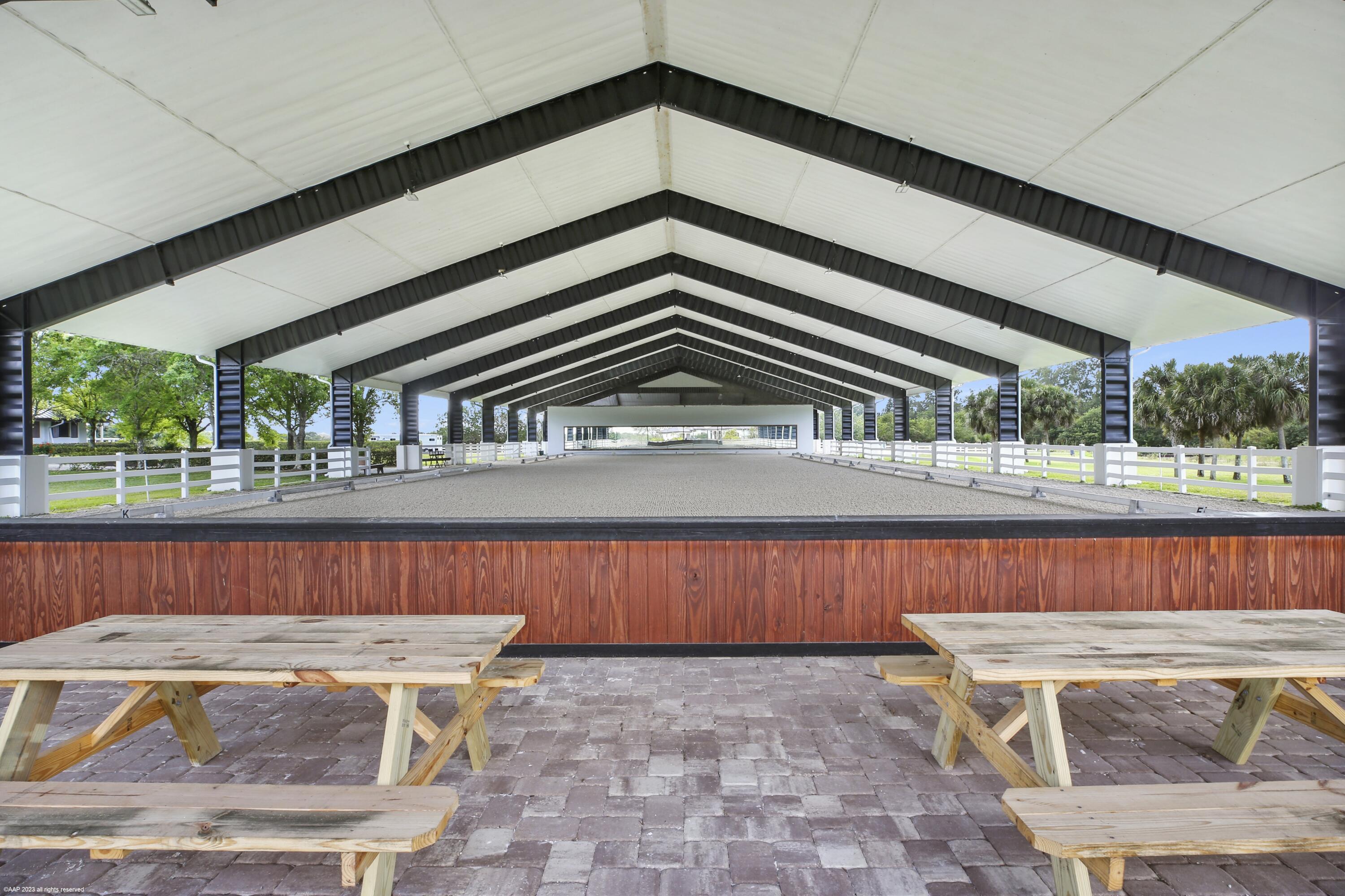 3790 Hanover Circle Loxahatchee, FL 33470 - Photo 30 of 73 a view of a chairs and table in the balcony