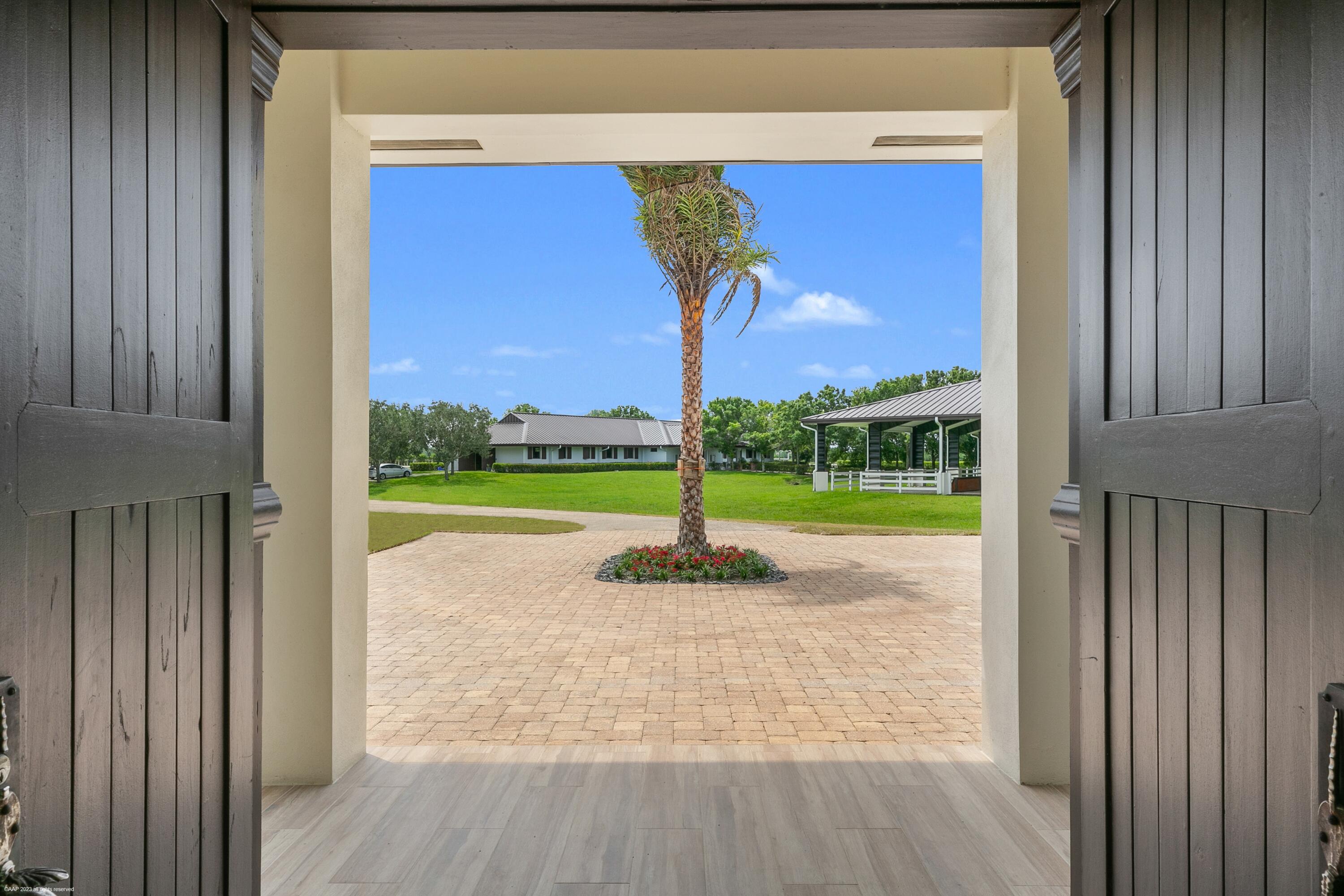 3790 Hanover Circle Loxahatchee, FL 33470 - Photo 44 of 73 a view of outdoor space patio and entertaining space