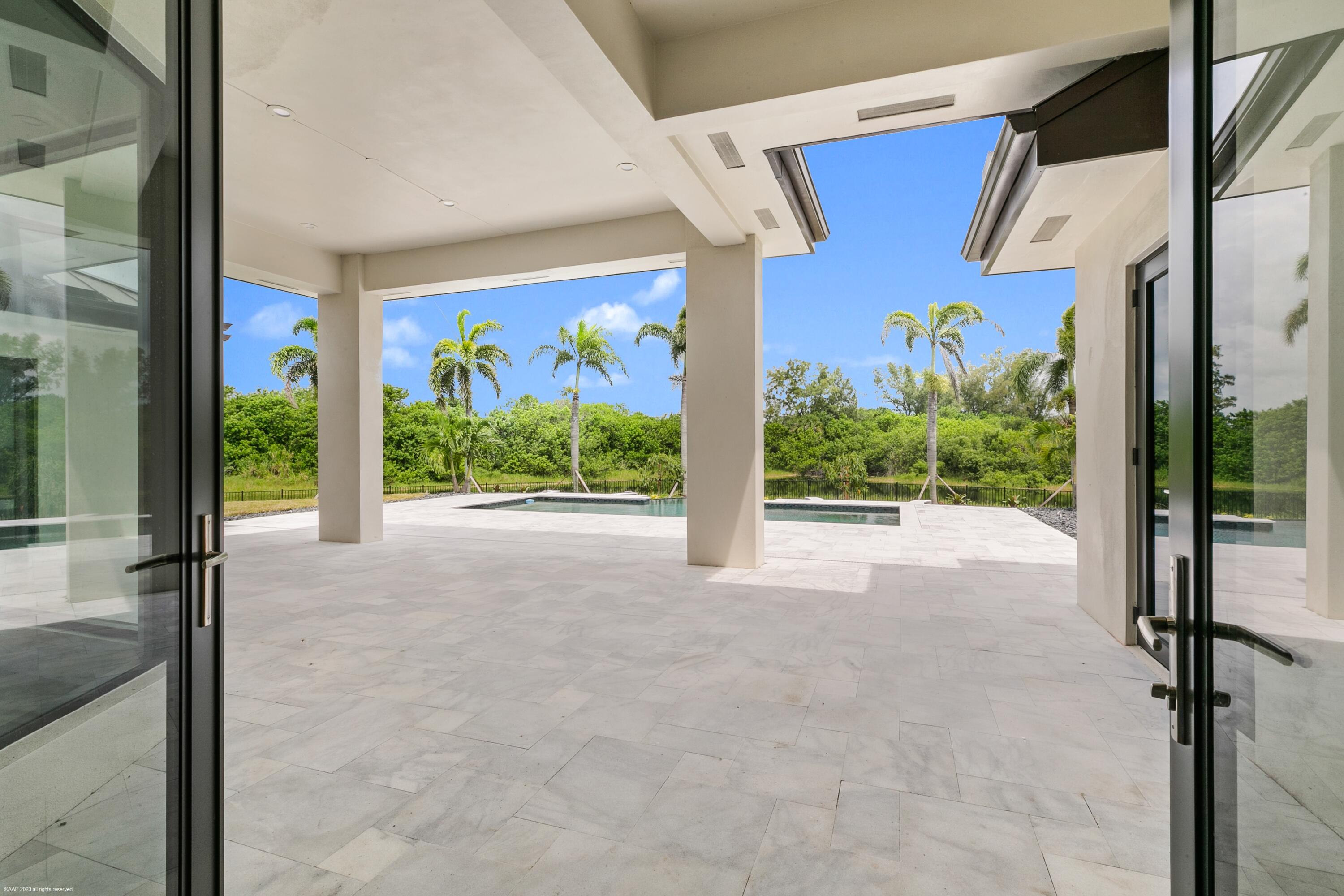 3790 Hanover Circle Loxahatchee, FL 33470 - Photo 50 of 73 a view of a room with a flat screen tv