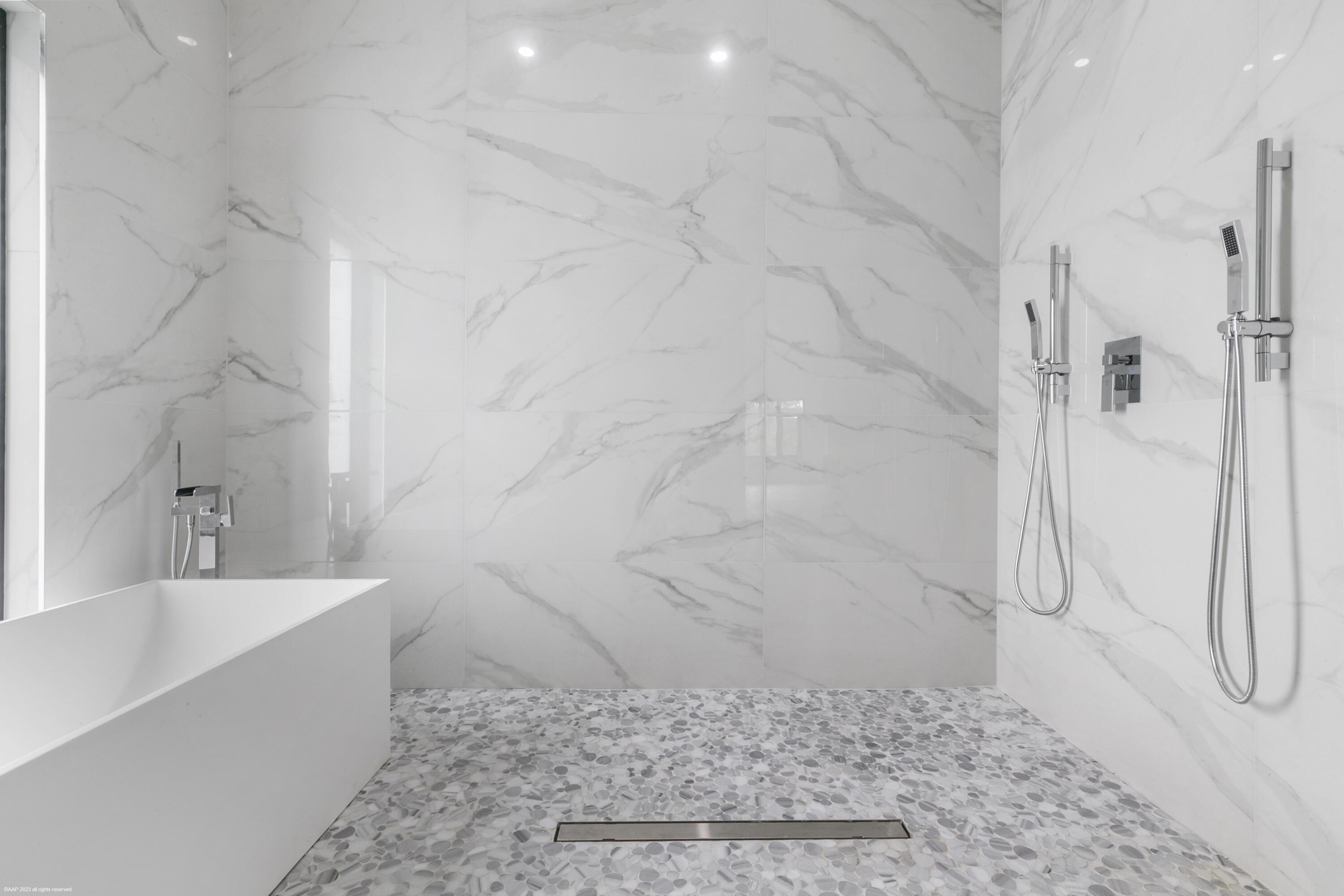 3790 Hanover Circle Loxahatchee, FL 33470 - Photo 59 of 73 a bathroom with a bathtub and shower