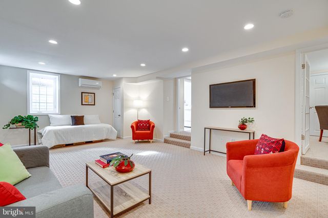 a view of a yard with a house in the background