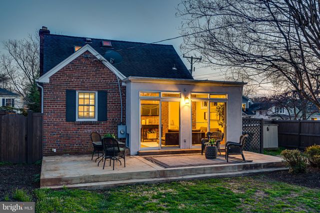 a view of swimming pool with outdoor seating