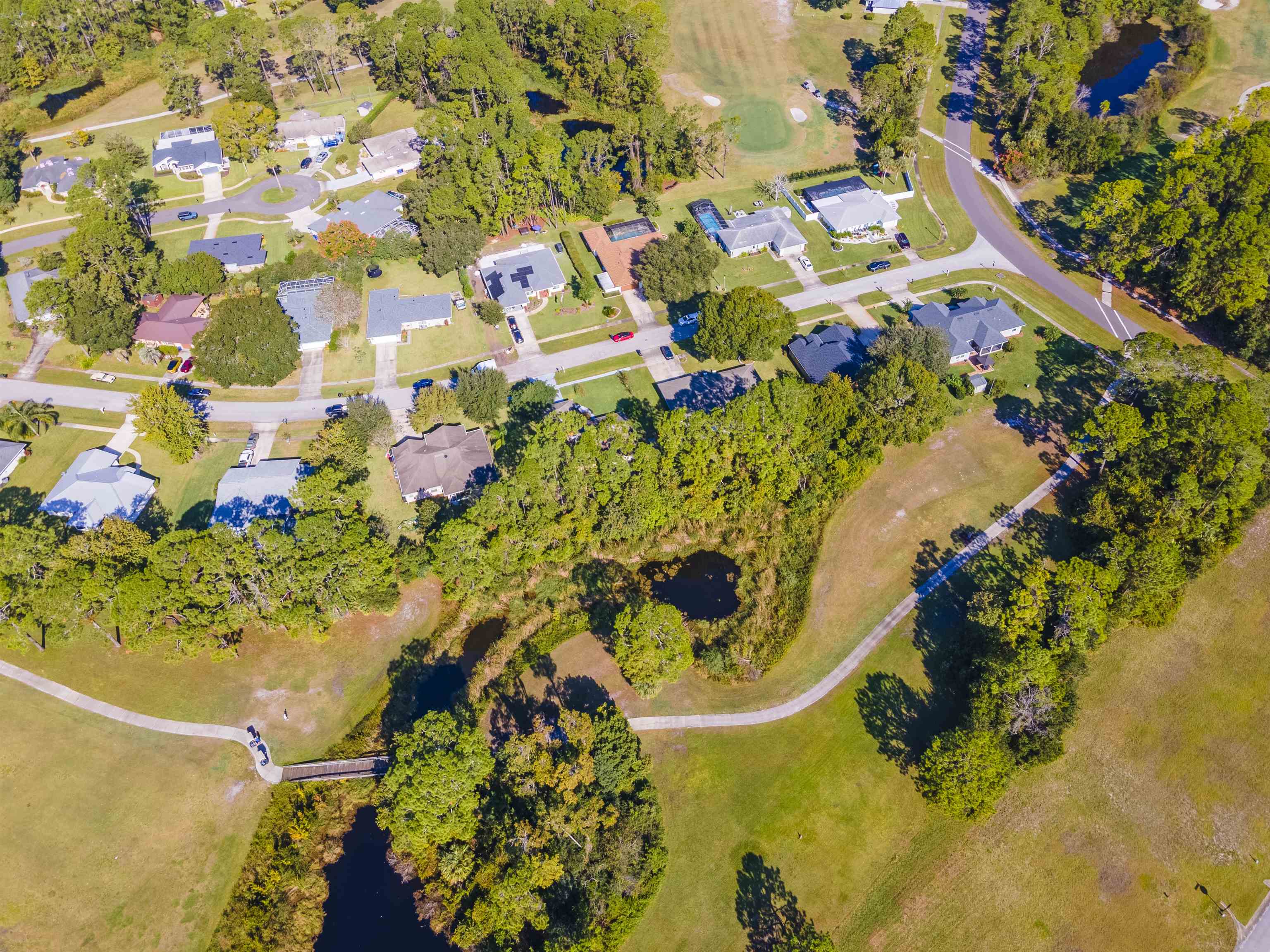 311 Graciela Circle St. Augustine, FL 32086 - Photo 3 of 65 Aerial overview of property's location with nearby suburban area