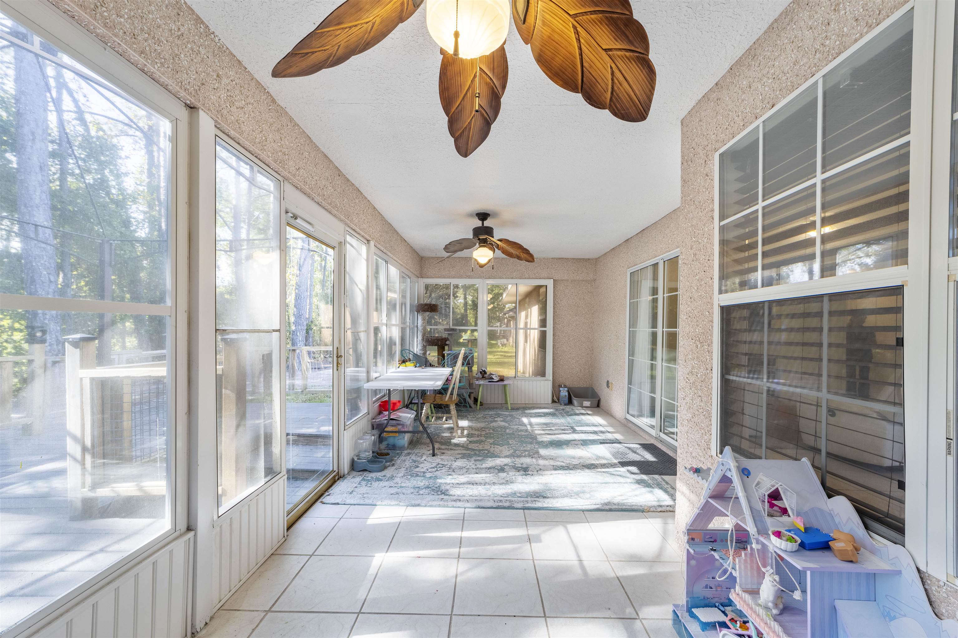 311 Graciela Circle St. Augustine, FL 32086 - Photo 31 of 65 Sunroom / solarium with a ceiling fan