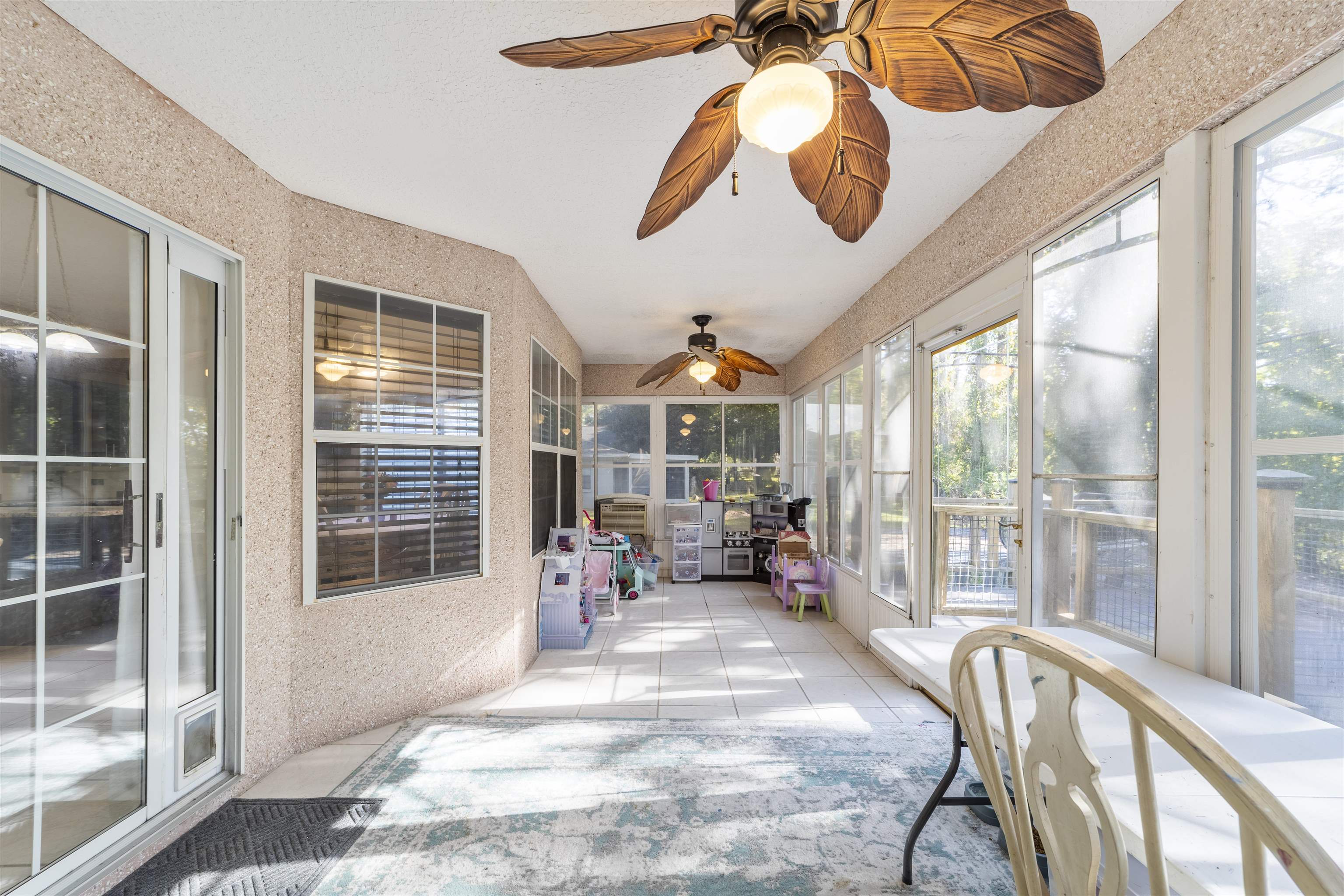 311 Graciela Circle St. Augustine, FL 32086 - Photo 32 of 65 Sunroom featuring ceiling fan