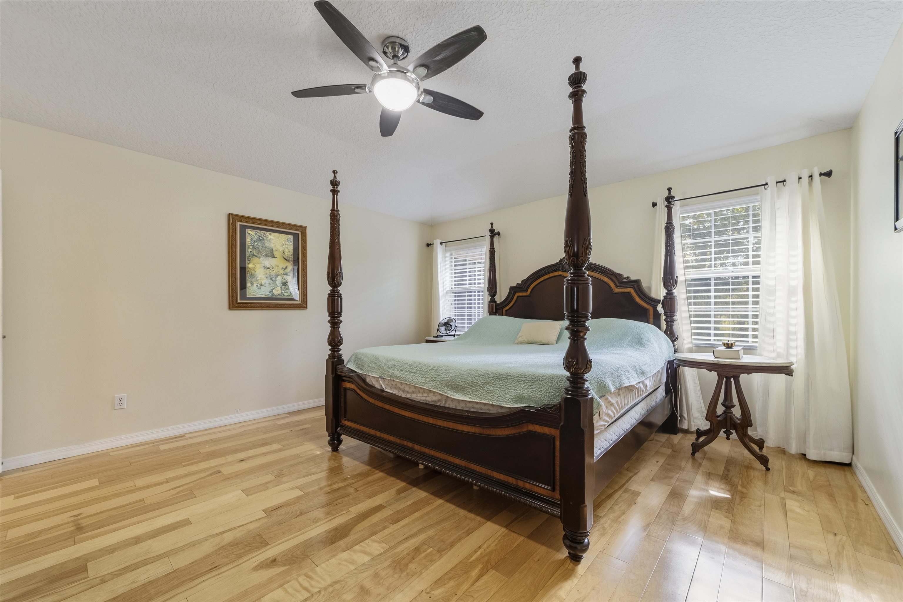 311 Graciela Circle St. Augustine, FL 32086 - Photo 33 of 65 Bedroom featuring multiple windows, light wood-style flooring, and ceiling fan