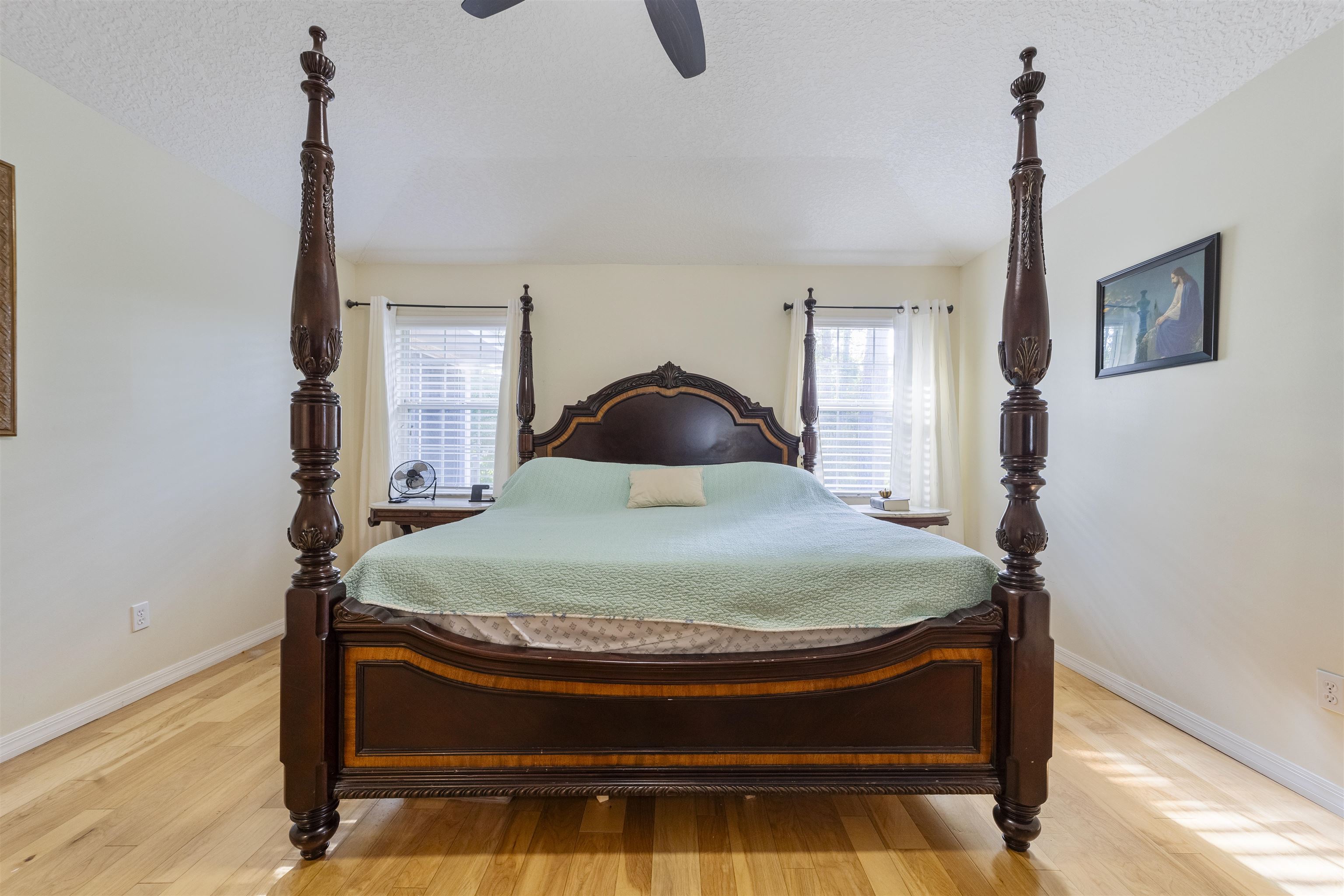 311 Graciela Circle St. Augustine, FL 32086 - Photo 34 of 65 Bedroom with light wood-type flooring, a ceiling fan, and a textured ceiling