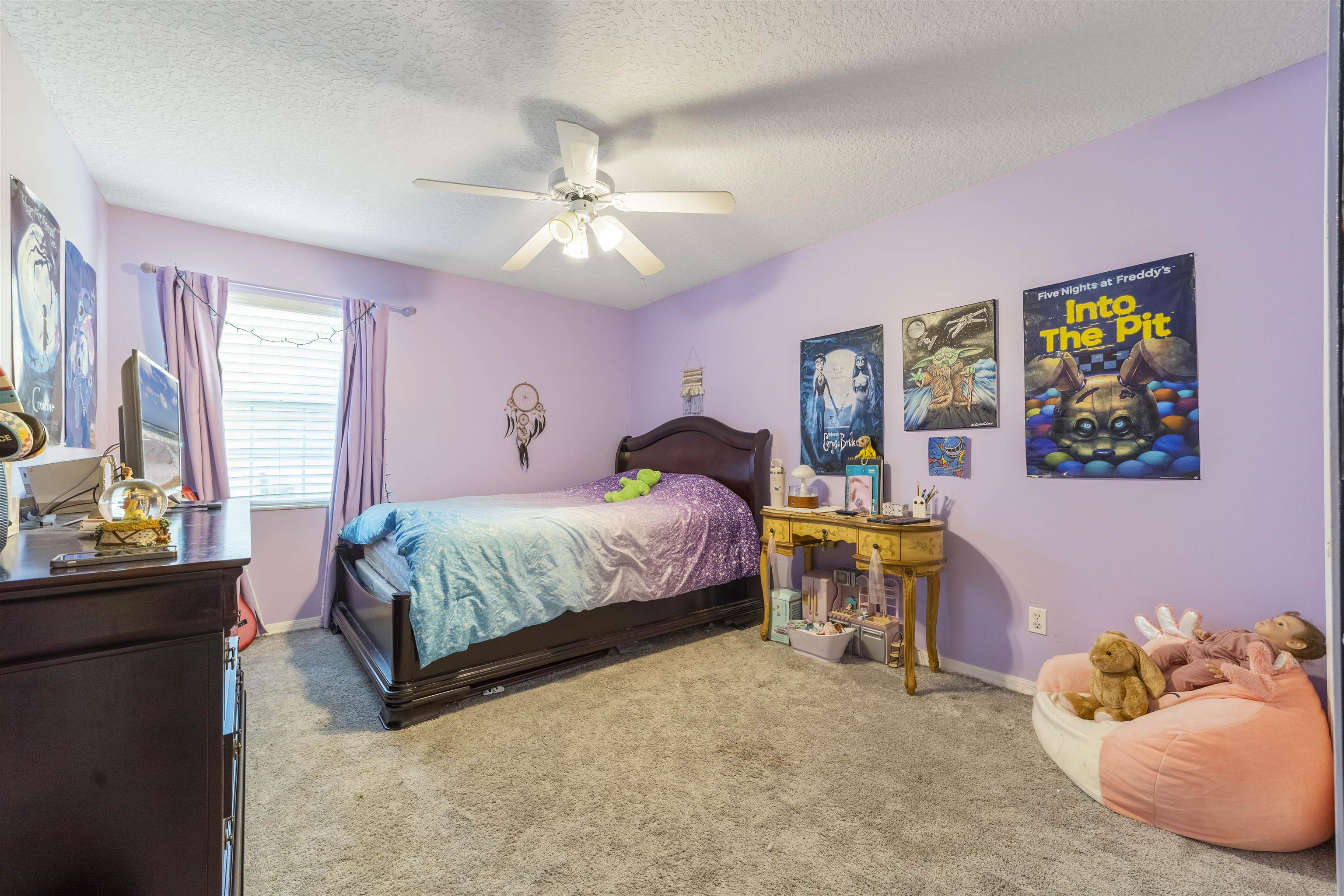 311 Graciela Circle St. Augustine, FL 32086 - Photo 45 of 65 Bedroom with carpet, a textured ceiling, and ceiling fan